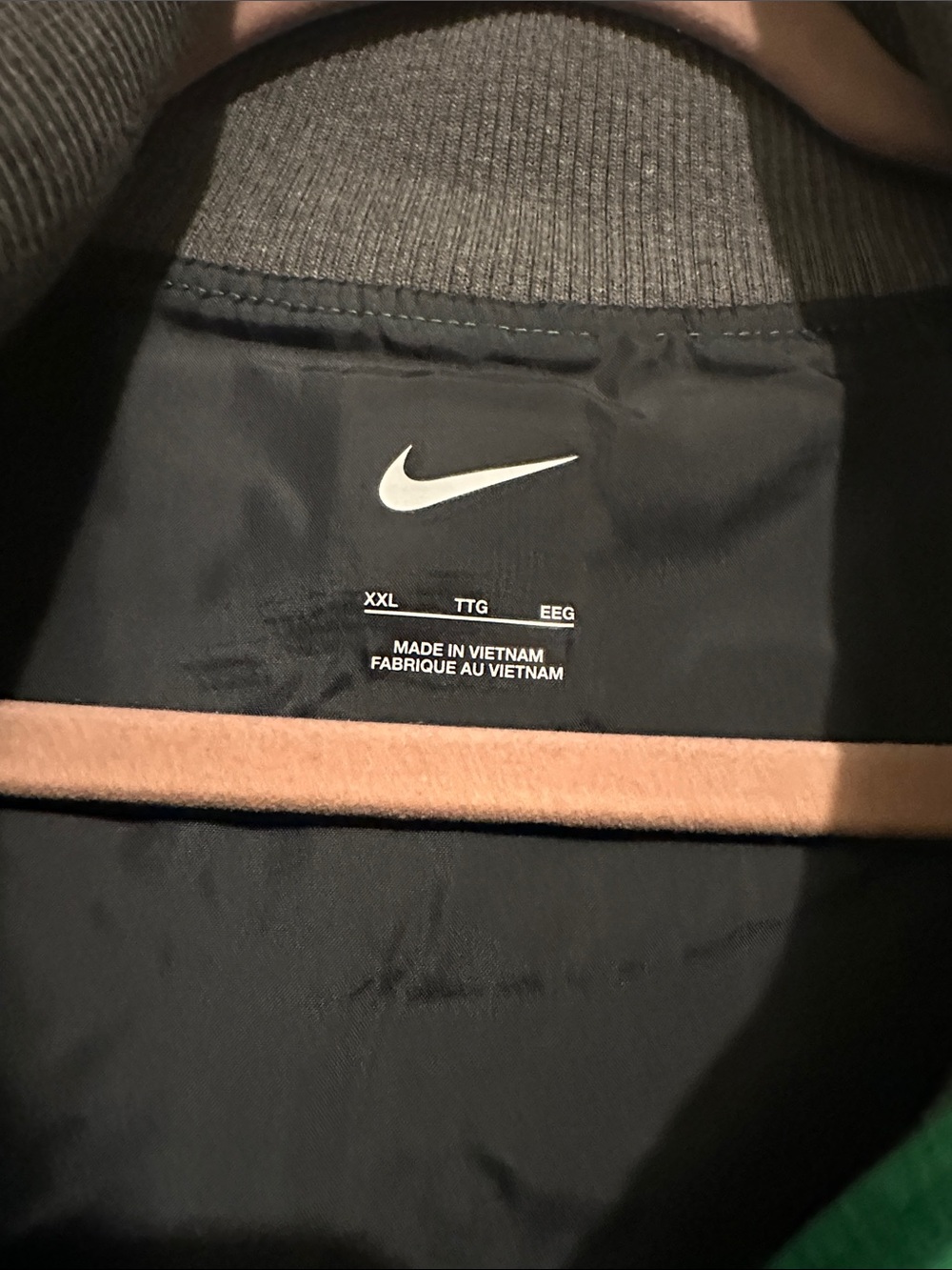 NWT Nike Green and Black Nike Women's Varsity Jacket. Size XXL. 32” L x 23”W. - Picture 2 of 5